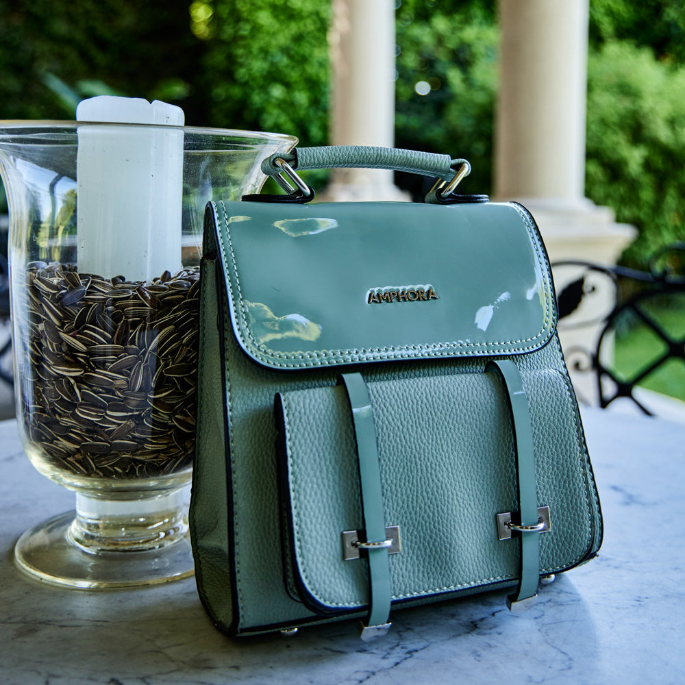 Kelly backpack with small aqua green lid